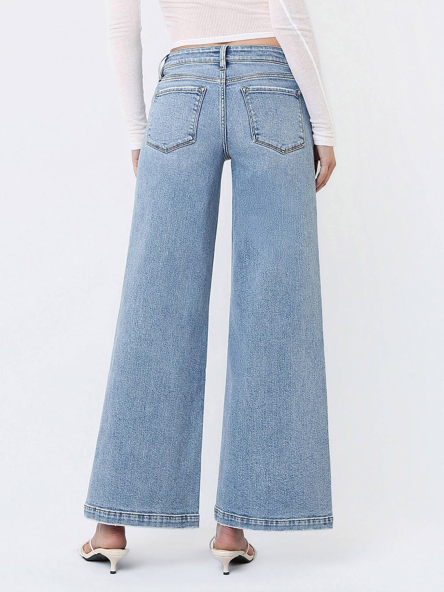 MID RISE SEAM DETAIL W FRONT SLIT HEM WIDE JEANS