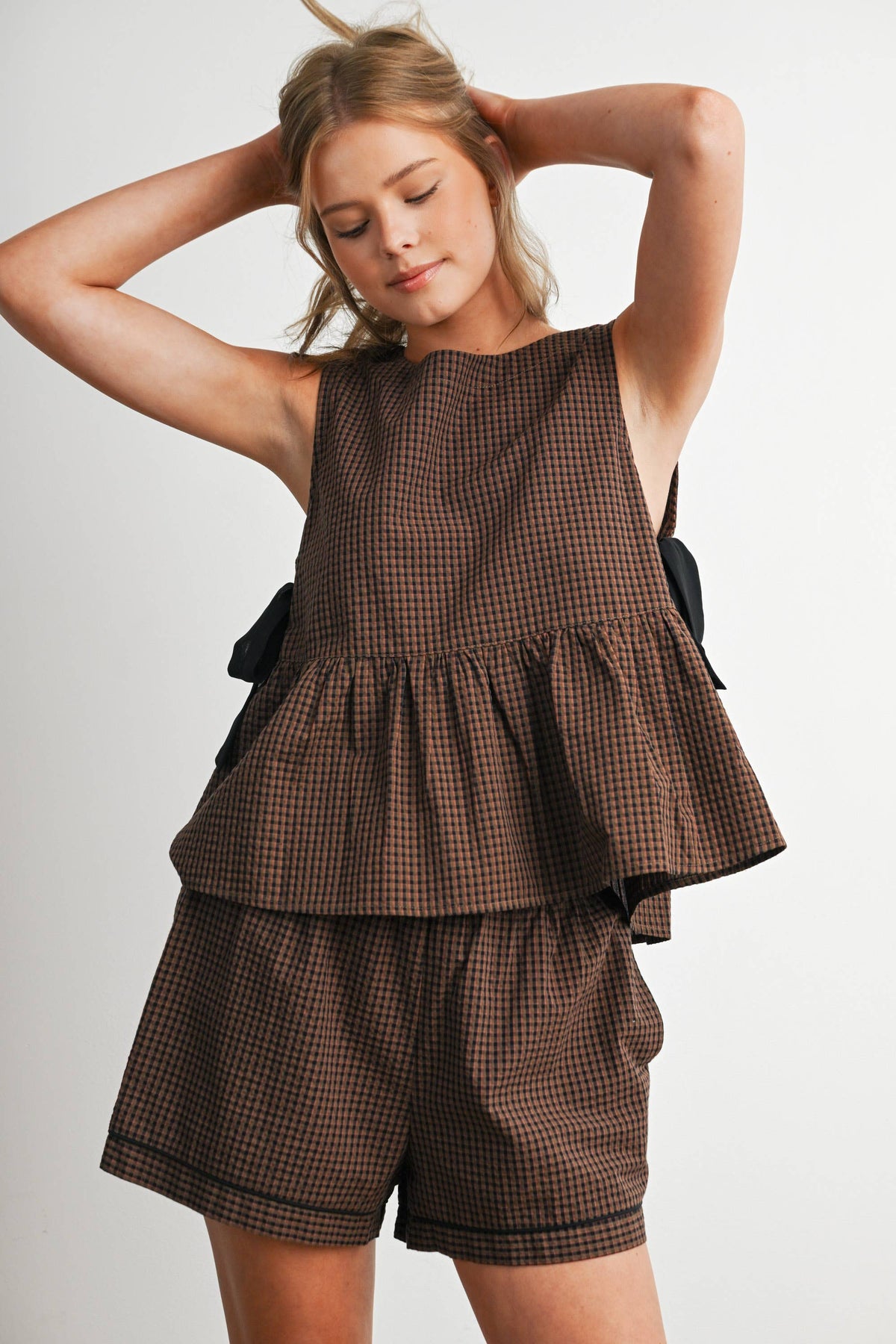 Checkered Peplum Sleeveless Top