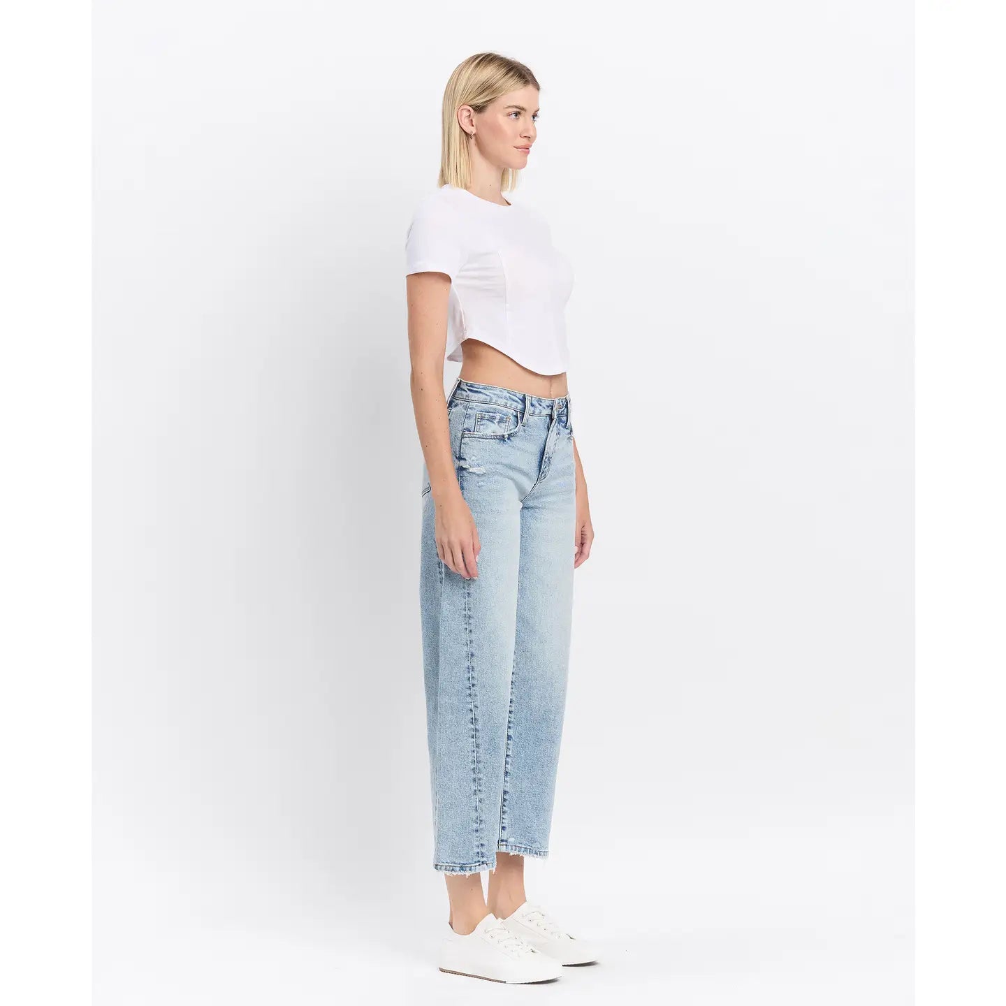 High Rise Twist Barrel Jeans