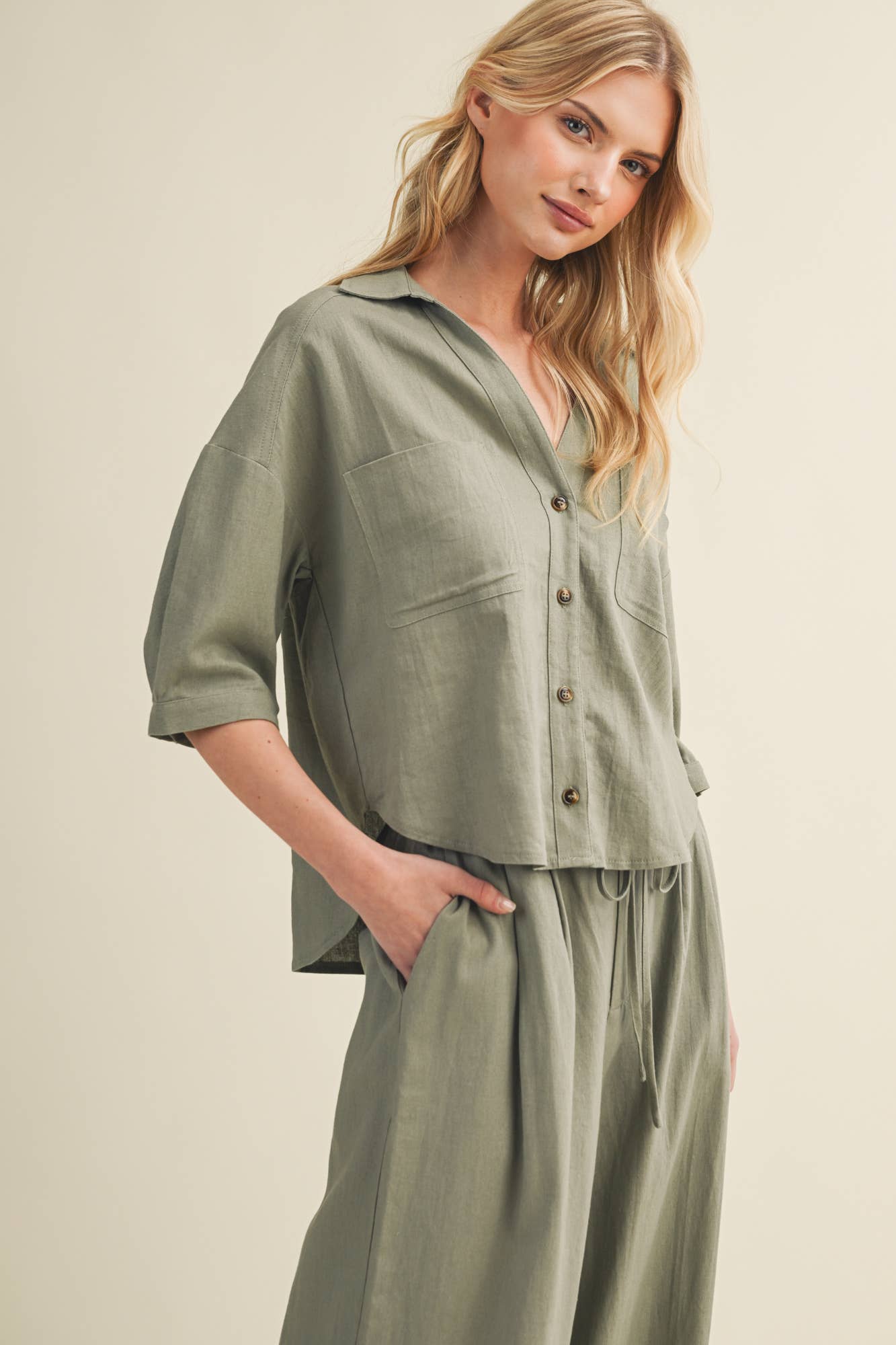 Voluminous Pleated Back Architectural Top