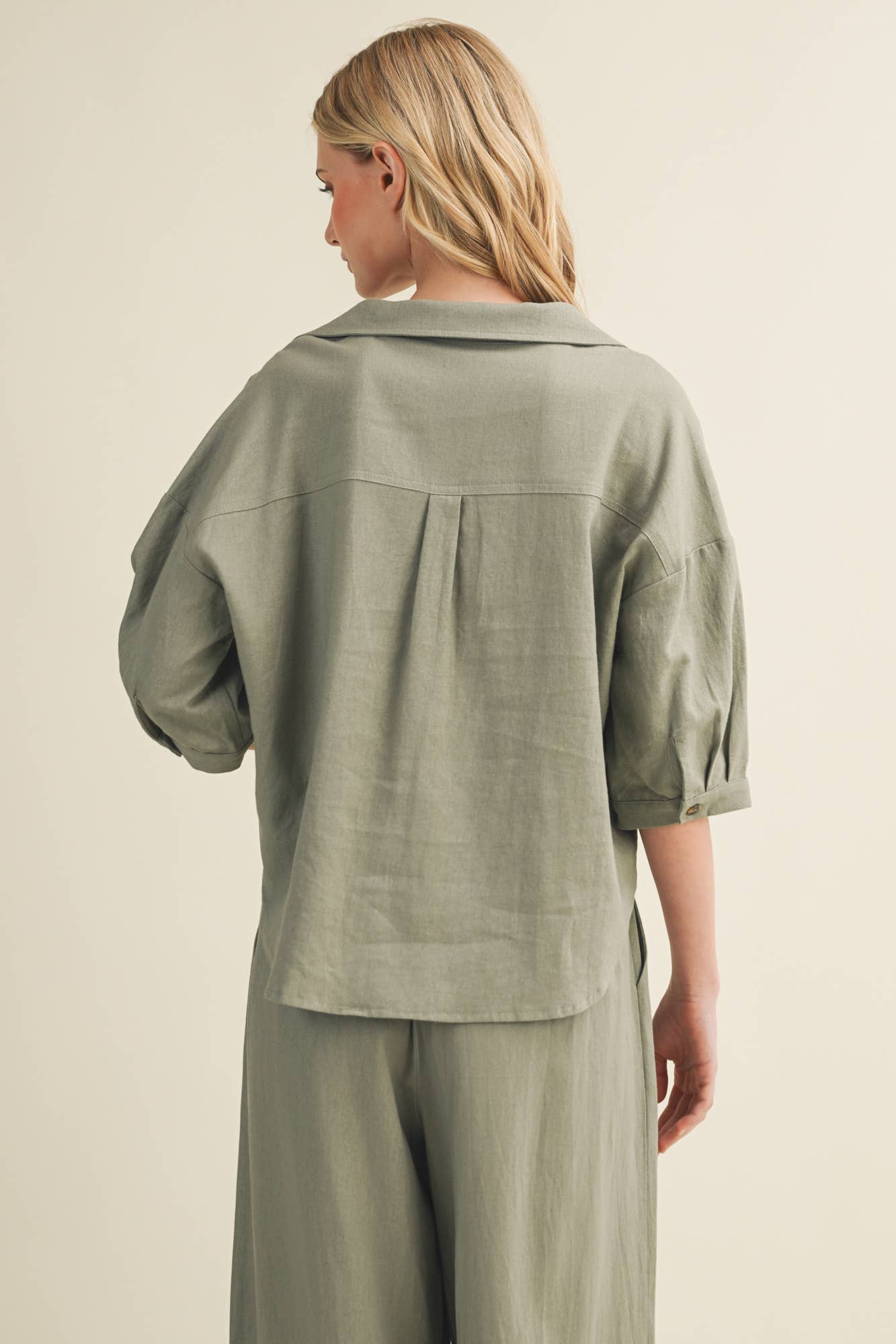 Voluminous Pleated Back Architectural Top