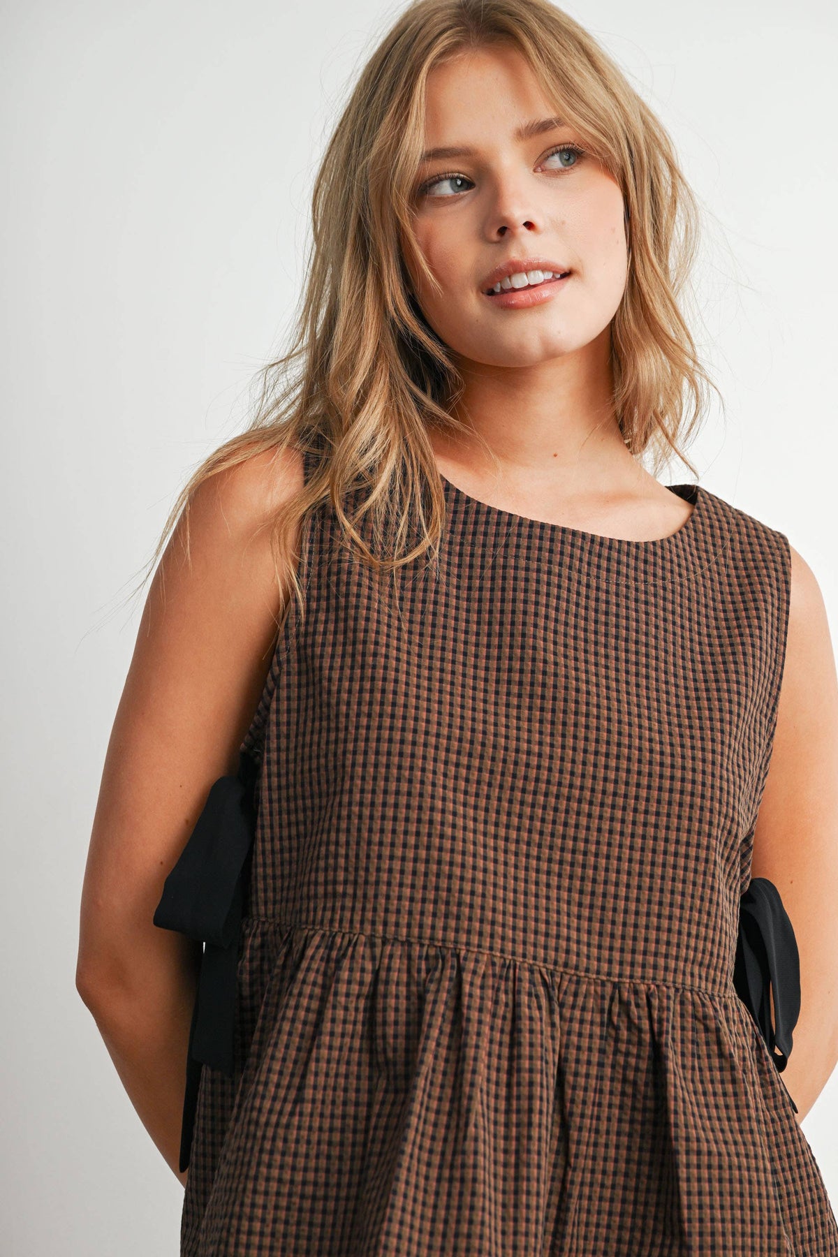 Checkered Peplum Sleeveless Top