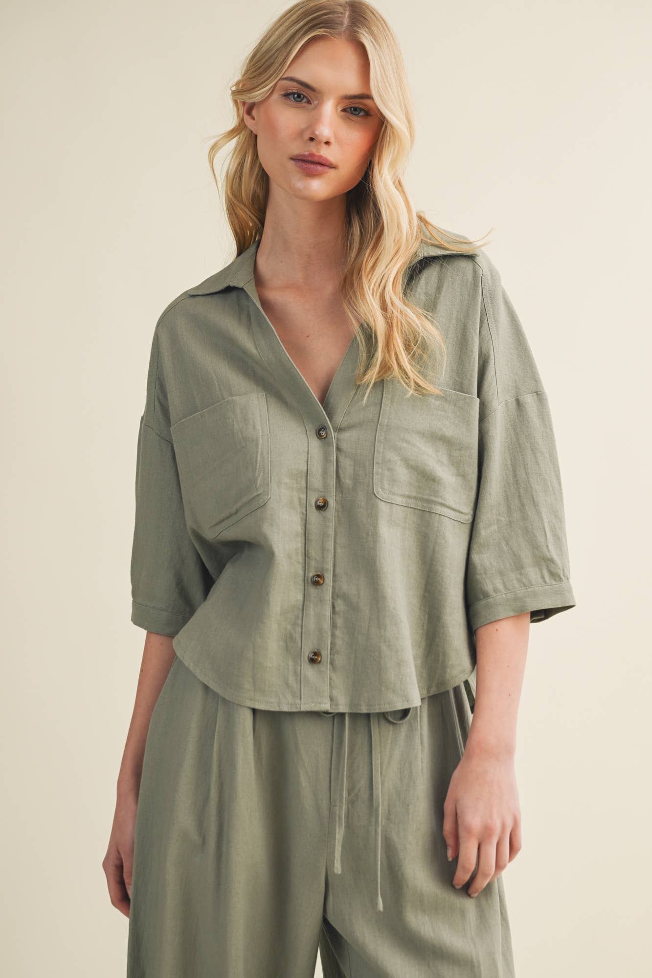 Voluminous Pleated Back Architectural Top