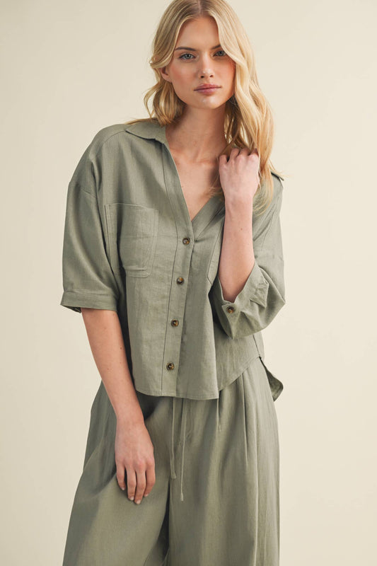 Voluminous Pleated Back Architectural Top