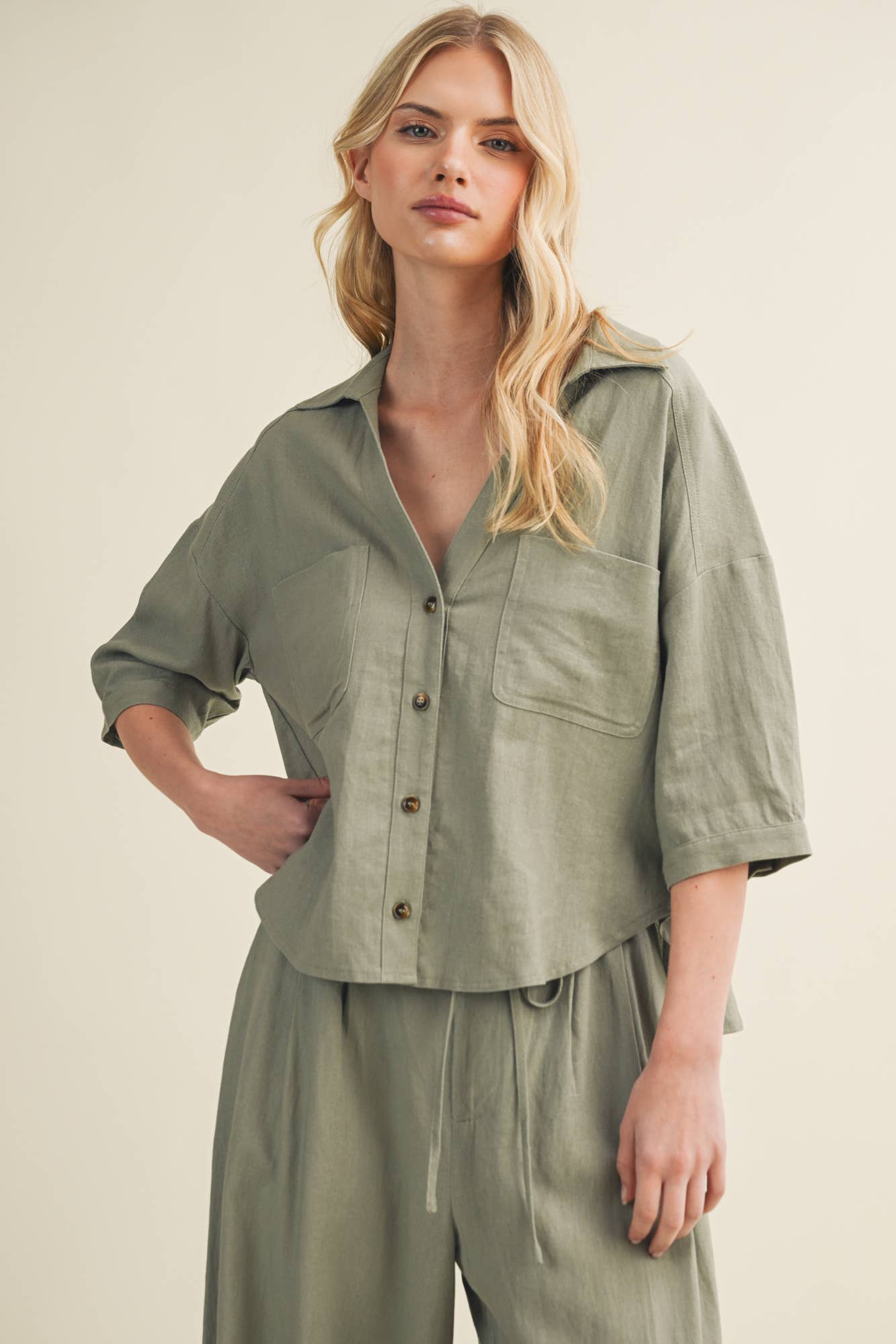 Voluminous Pleated Back Architectural Top